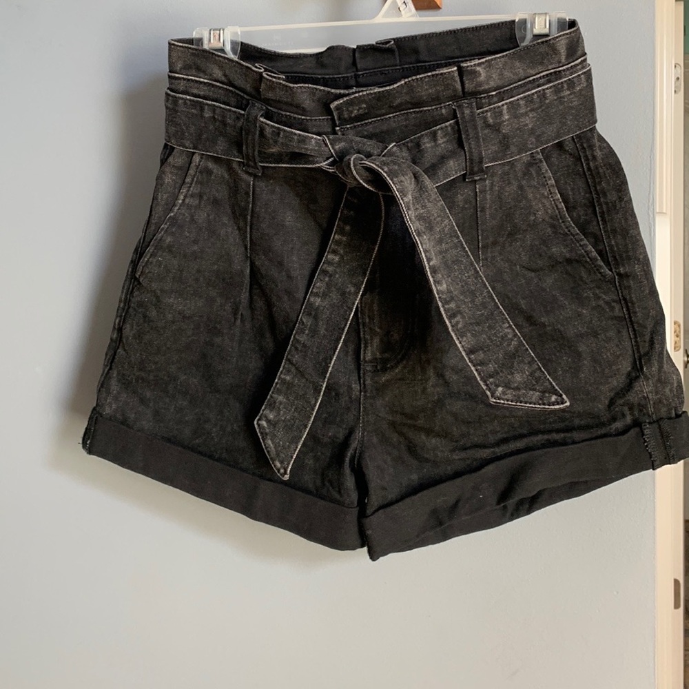High rise. Tie front, removable belt. Black jean shorts